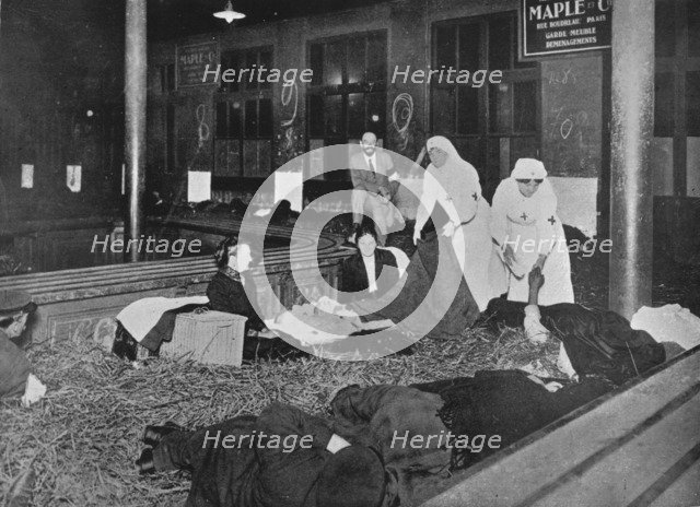 'Customs Room at the Gare du Nord, Paris, a relief station for French refugees', 1914. Artist: Unknown.
