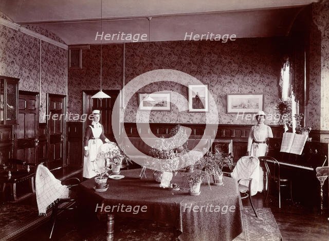 Claybury Asylum, Woodford, Essex: a social room (?) , [1893?]. Creator: London & County Photographic Co.