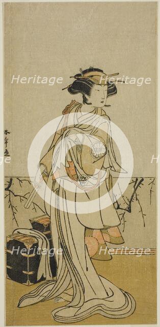 The Actor Segawa Yujiro I as Osai, a Female Hairdresser, in the Play Kamuri Kotoba Soga..., c. 1776. Creator: Shunsho.