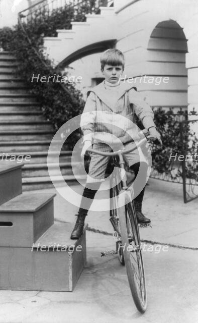 Archie Roosevelt on a bicycle, c1902 June 17. Creator: Frances Benjamin Johnston.