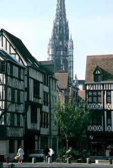 Half-timbered houses with St Maclou Church in the background, Rouen, Normandy, France