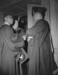 Faculty members of the Howard University during commencement, Washington, D.C, 1942. Creator: Gordon Parks.