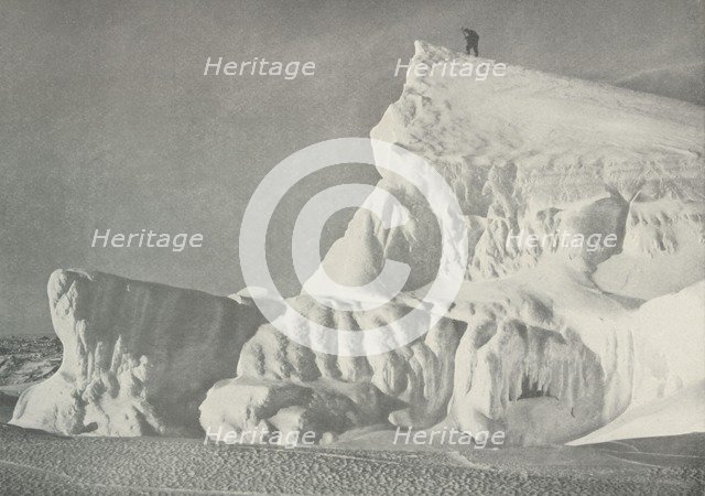 'On the Summit of an Iceberg', c1911, (1913). Artist: Herbert Ponting.