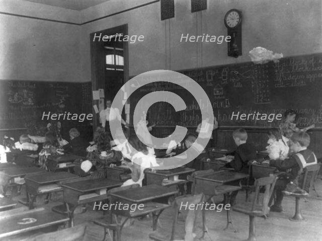 Classroom scenes in Washington, D.C. public schools: general classroom scenes, 1st Division, (1899?) Creator: Frances Benjamin Johnston.