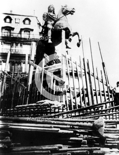 Protective measures for the statue of Louis XIV, Paris, 1940. Artist: Unknown