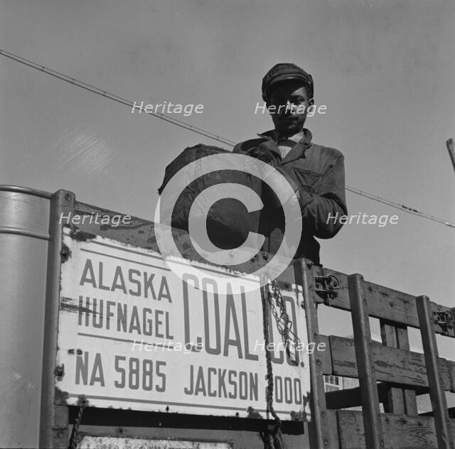Possibly: Negro coal hauler for the Alaska Hufnagel Coal Company, Washington, D.C., 1942. Creator: Gordon Parks.