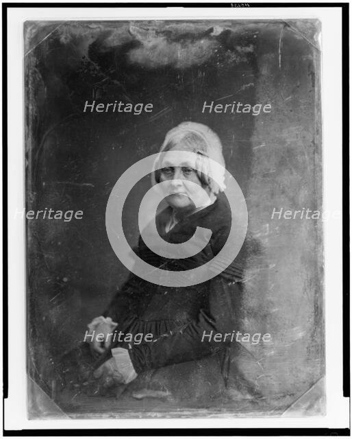 Unidentified woman, half-length portrait, three-quarters to the left..., between 1851 and 1860. Creator: Mathew Brady.