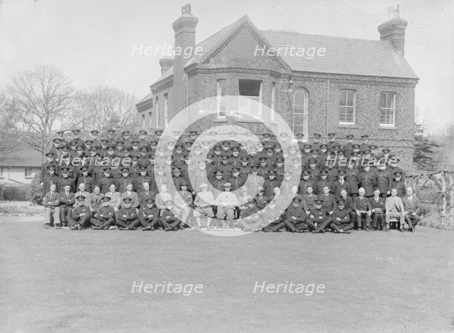 Group portrait of wardens, c1935. Creator: Kirk & Sons of Cowes.