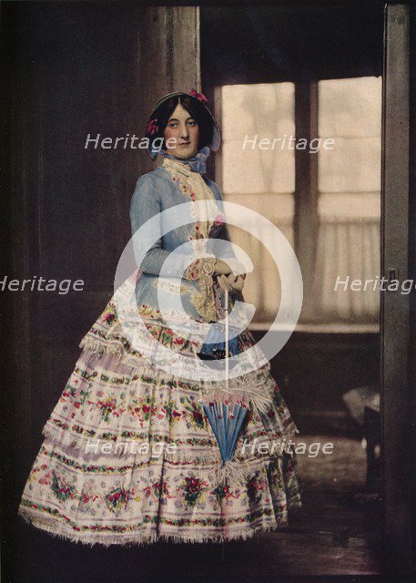 'An embroidered coat, with a lovely silk gauze skirt. In fashion between 1850 and 1860', c1913. Artist: Unknown.