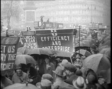 Civilians Demonstrating in London Against Continuous Strikes in the Rain. Signs Read..., 1926. Creator: British Pathe Ltd.