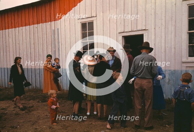 Group of homesteaders in front of the bean house ..., Pie Town, New Mexico Fair, 1940. Creator: Russell Lee.