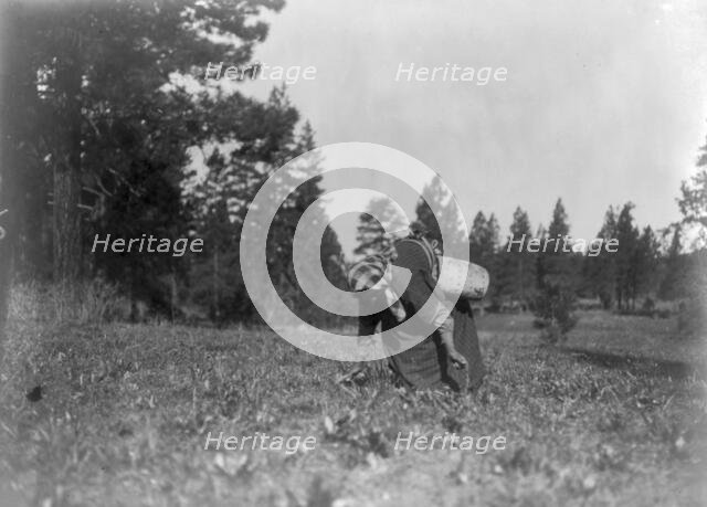 The piyake gatherer, c1910. Creator: Edward Sheriff Curtis.