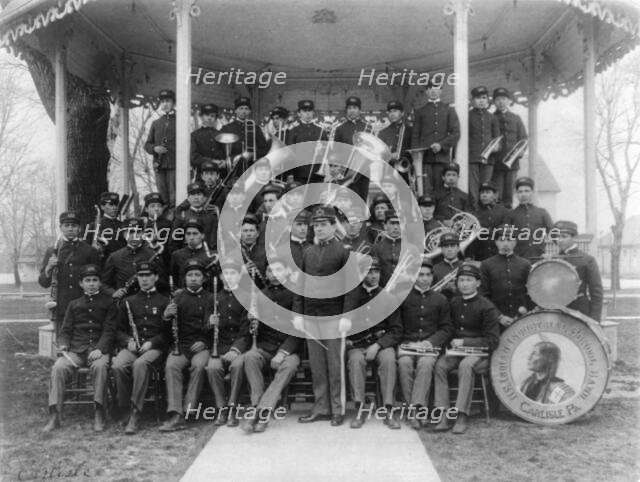 Carlisle Indian School, Carlisle, Pa. Band posed at the bandstand, 1901. Creator: Frances Benjamin Johnston.