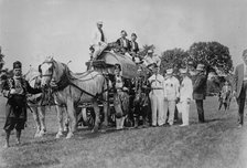 Shriners on water wagon, Rochester, between c1910 and c1915. Creator: Bain News Service.