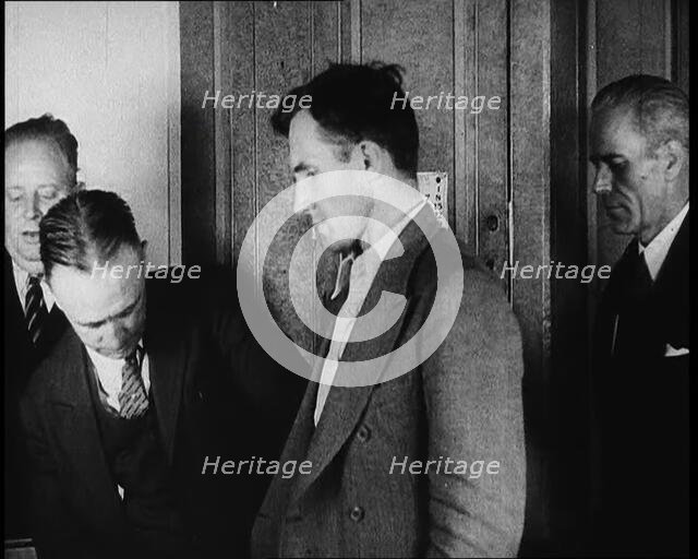 Bruno Richard Hauptmann Being Presented To the Press by the New York Police Department, 1930s. Creator: British Pathe Ltd.