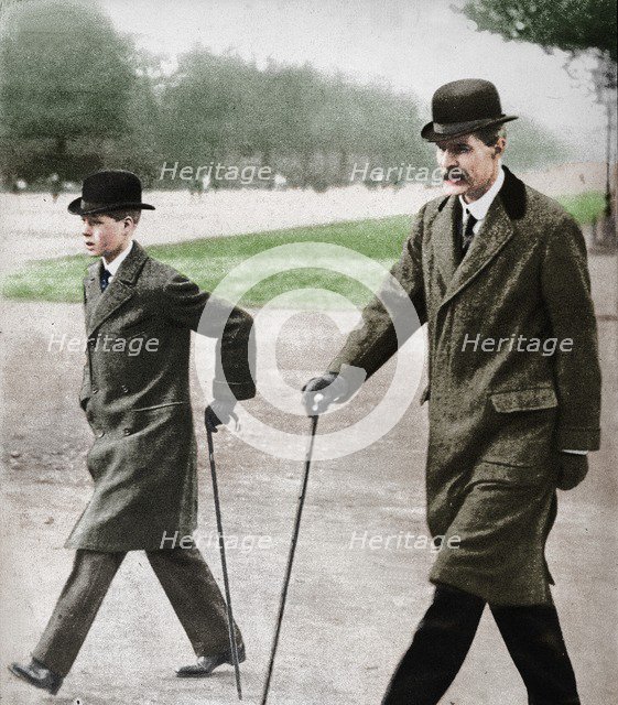 Prince Edward walking with Mr HP Hansell, his tutor, at Auteuil, France, 1912 (1936). Creator: Unknown.