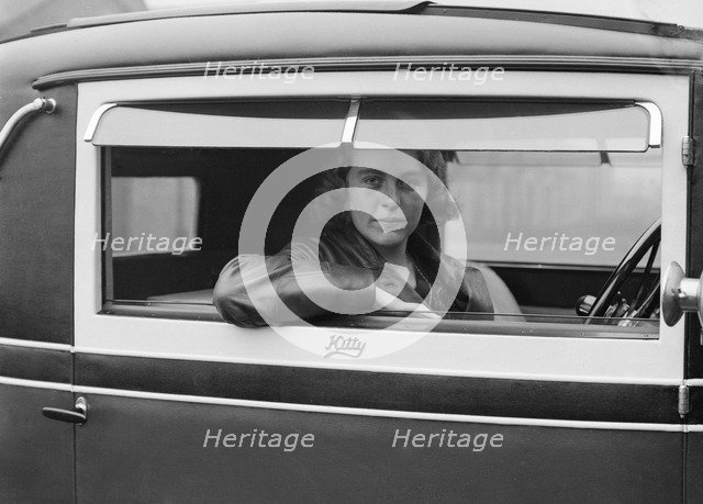 Kitty Brunell behind the wheel of a Talbot 14/45, c1930. Artist: Bill Brunell.