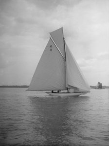 Light winds for the 8 Metre 'Ventana' (H11) sailing with spinnaker, 1912. Creator: Kirk & Sons of Cowes.