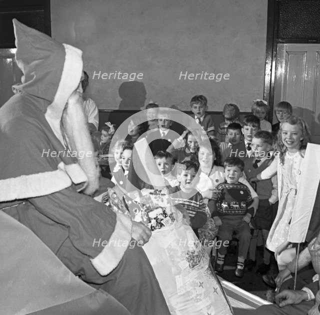 Santa Claus at a Methodist church in Swinton, South Yorkshire, 1964. Artist: Michael Walters