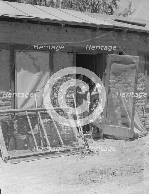 Mexican family, Brawley County, Imperial Valley, California, 1935. Creator: Dorothea Lange.
