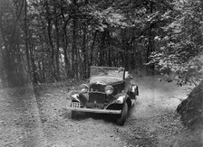 Ford V8 competing in the B&HMC Brighton-Beer Trial, Fingle Bridge Hill, Devon, 1934. Artist: Bill Brunell.