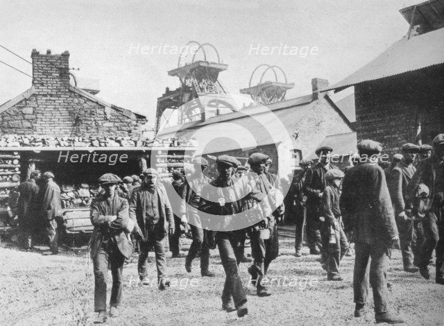 'Miners leaving the pithead after the expiration of their strike notices', 1915. Artist: Unknown.