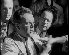 Crowd of Civilians Buying and Selling Stocks and Shares, 1932. Creator: British Pathe Ltd.