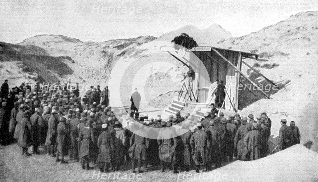 Easter mass in the dunes on the beaches of Belgium by the North Sea, World War I, 1915. Artist: Unknown