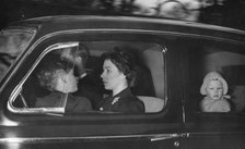 The Royal couple leaving Clarence House for Windsor after George VI's death, 1952.  Creator: Unknown.