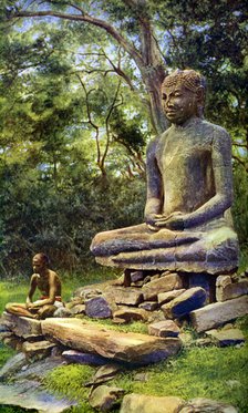 Stone Buddha, a relic of the past glory of Anuradhapura, Ceylon, c1924. Artist: Unknown