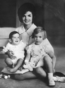 Jacqueline Kennedy with her children Caroline and John, c1961. Artist: Unknown
