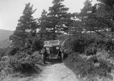 Kitty Brunell road testing a Riley 9 WD tourer, c1930. Artist: Bill Brunell.