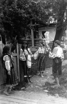 Young women spinning wool, Bistrita Valley, Moldavia, north-east Romania, c1920-c1945. Artist: Adolph Chevalier
