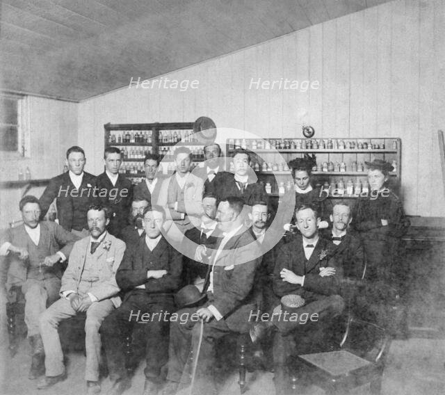 Group posed photo in classroom with Dr Wilton W.R. Love with Chemistry/Pharmacy students, 1894. Creator: Unknown.