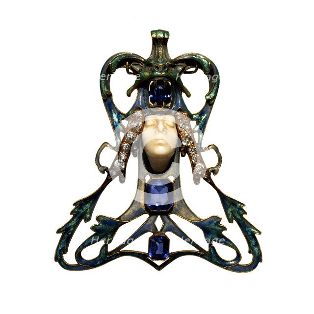 Female Face Pendant, 1897-1898.