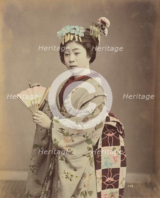 Young Woman with Fan, 1870s-1890s. Creator: Kusakabe Kimbei.