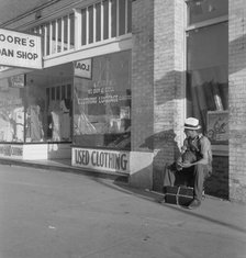 Main street storefront, Chickasaw, Oklahoma, 1937. Creator: Dorothea Lange.