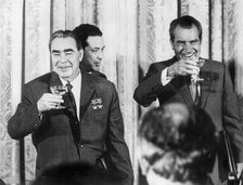 Soviet leader Leonid Brezhnev and US President Richard Nixon share a toast, c1972-1974. Artist: Unknown