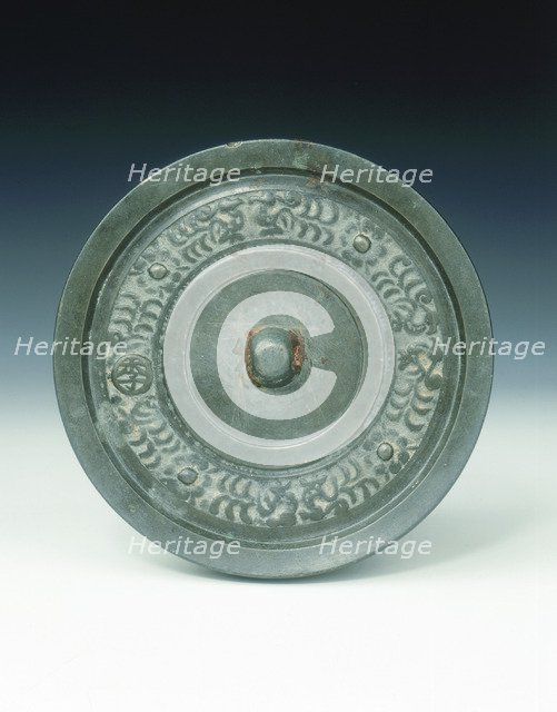 Bronze mirror with multi-armed Avalokitesvara and characters, Yuan dynasty, China, 1271-1368. Artist: Unknown