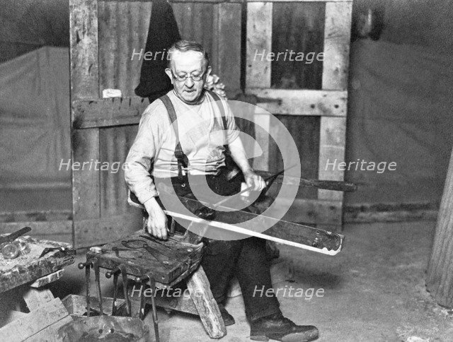 Worker at Whitefriars Glassworks, City of London, (early 20th century?). Artist: Unknown
