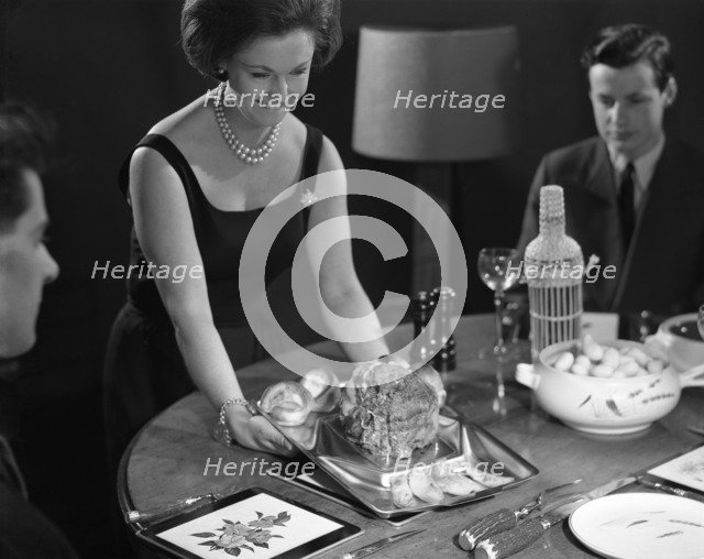 Dinner served, 1964.  Artist: Michael Walters