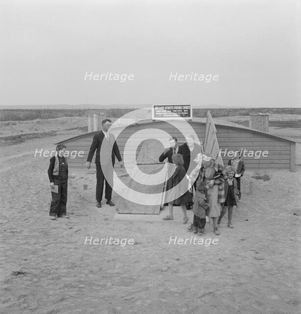 Congregation leaving after services, Dead Ox Flat, Oregon, 1939. Creator: Dorothea Lange.