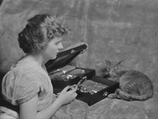 Cadmus, Miss, with Buzzer the cat, portrait photograph, 1914 Apr. 24. Creator: Arnold Genthe.