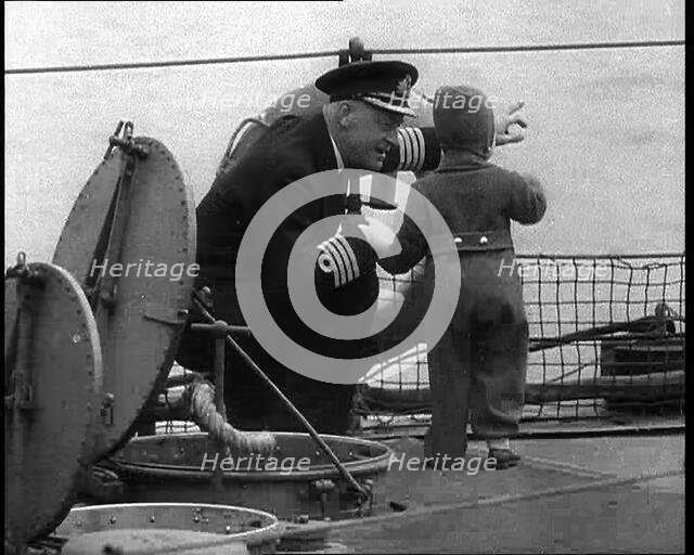 A Ship's Captain Pointing Out To the White Cliffs of Dover To Show the Young Princess..., 1940. Creator: British Pathe Ltd.