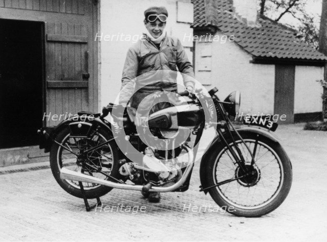 Donald Campbell outside a garage at Headley Grove, Surrey, 1938. Artist: Unknown