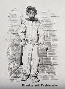 A mentally ill patient with mask and hand restraints, 1908. Creator: Unknown.