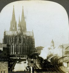 Cologne Cathedral from a railway bridge, Cologne, Germany.Artist: EW Kelley