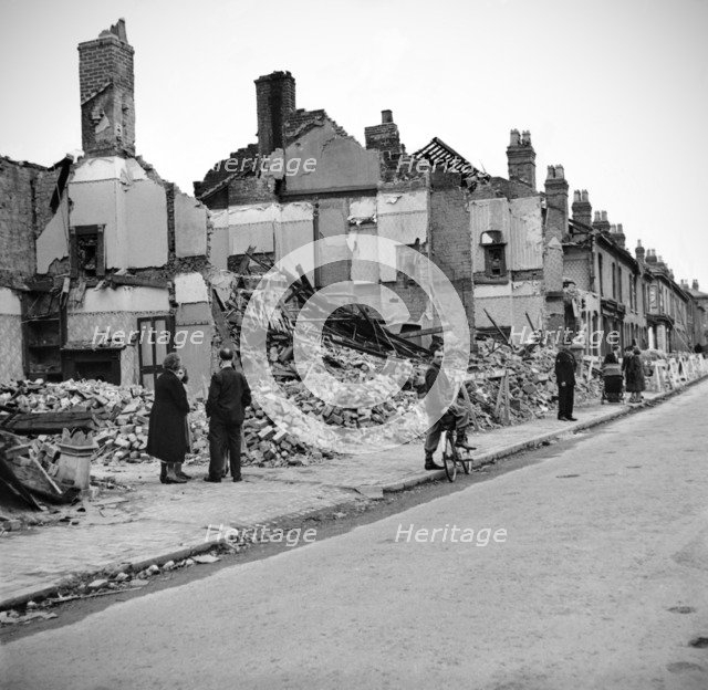 Wartime bomb damage, Highgate Road, Sparkbrook, Birmingham, West Midlands, 29 July 1942. Artist: James Nelson.