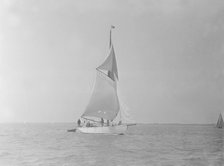 The cutter 'Mavourneen' running downwind, 1922. Creator: Kirk & Sons of Cowes.
