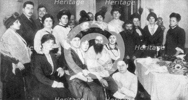 Grigori Rasputin and a group of women, 1917. Artist: Unknown
